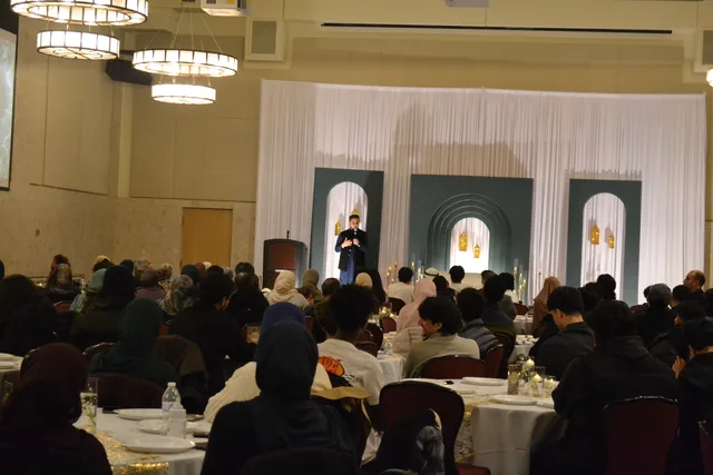 Audience listening to a speaker