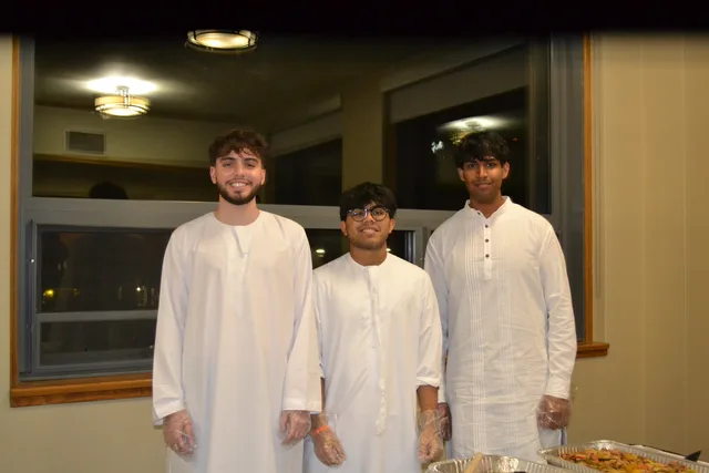 Volunteers behind the serving table