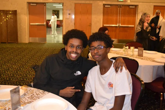 Two attendees seated together