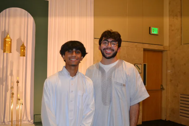 Two attendees posing together