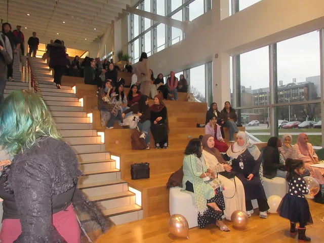 Guests gathering on the wide wooden steps